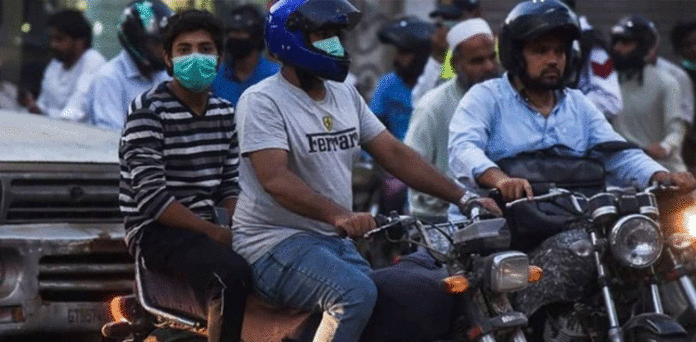 ڈبل سواری اور چہرہ ڈھانپنے پر پابندی عائد