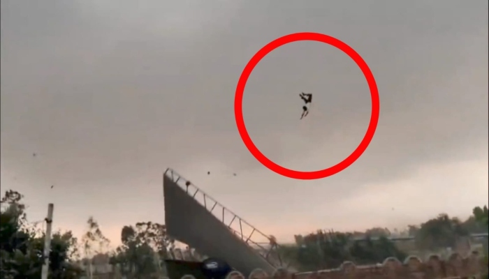 طاقتور طوفان سے شخص ہوا میں اُڑ گیا